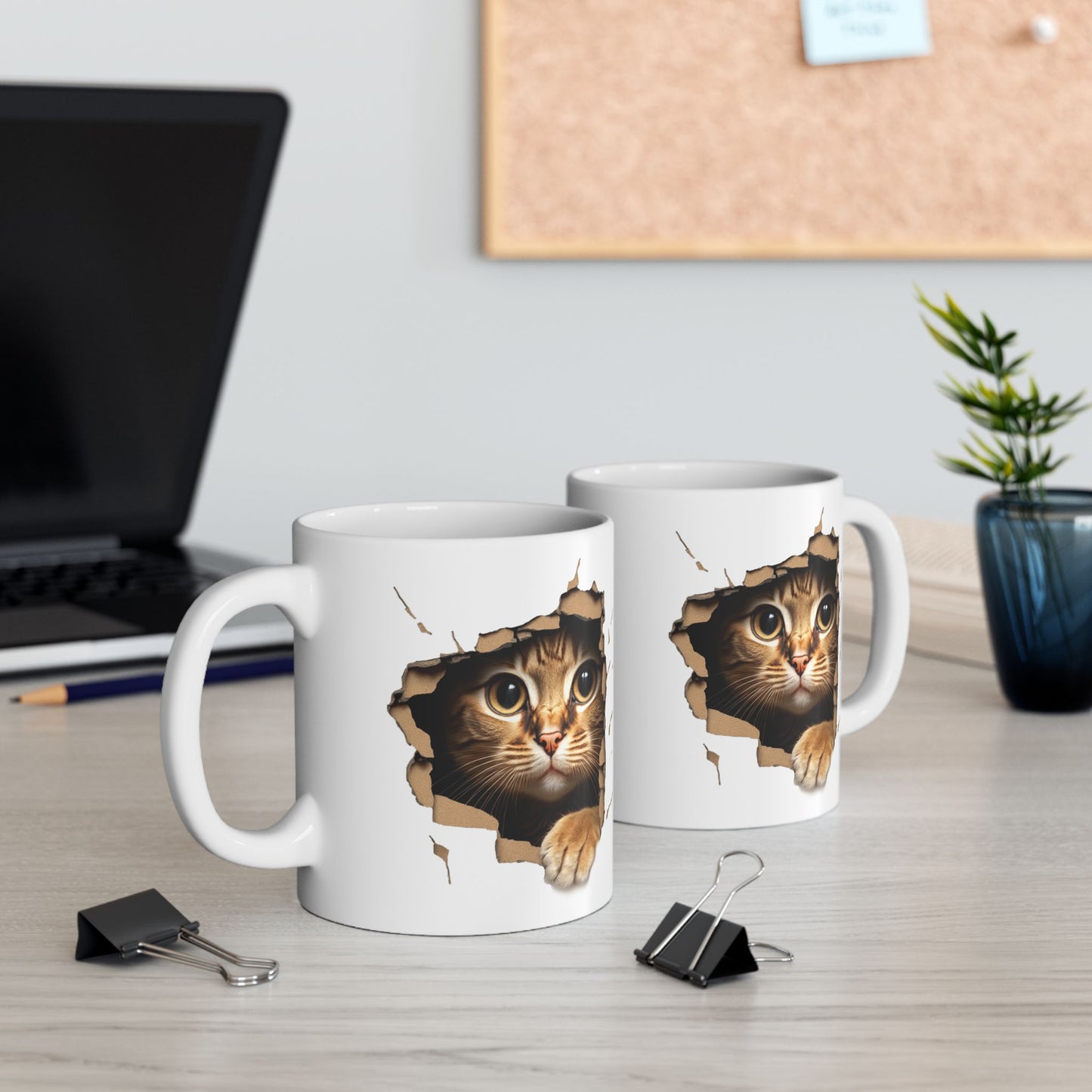 Cute Kitten Looks From Torn Wall Mug
