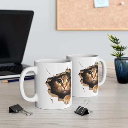 Cute Kitten Looks From Torn Wall Mug
