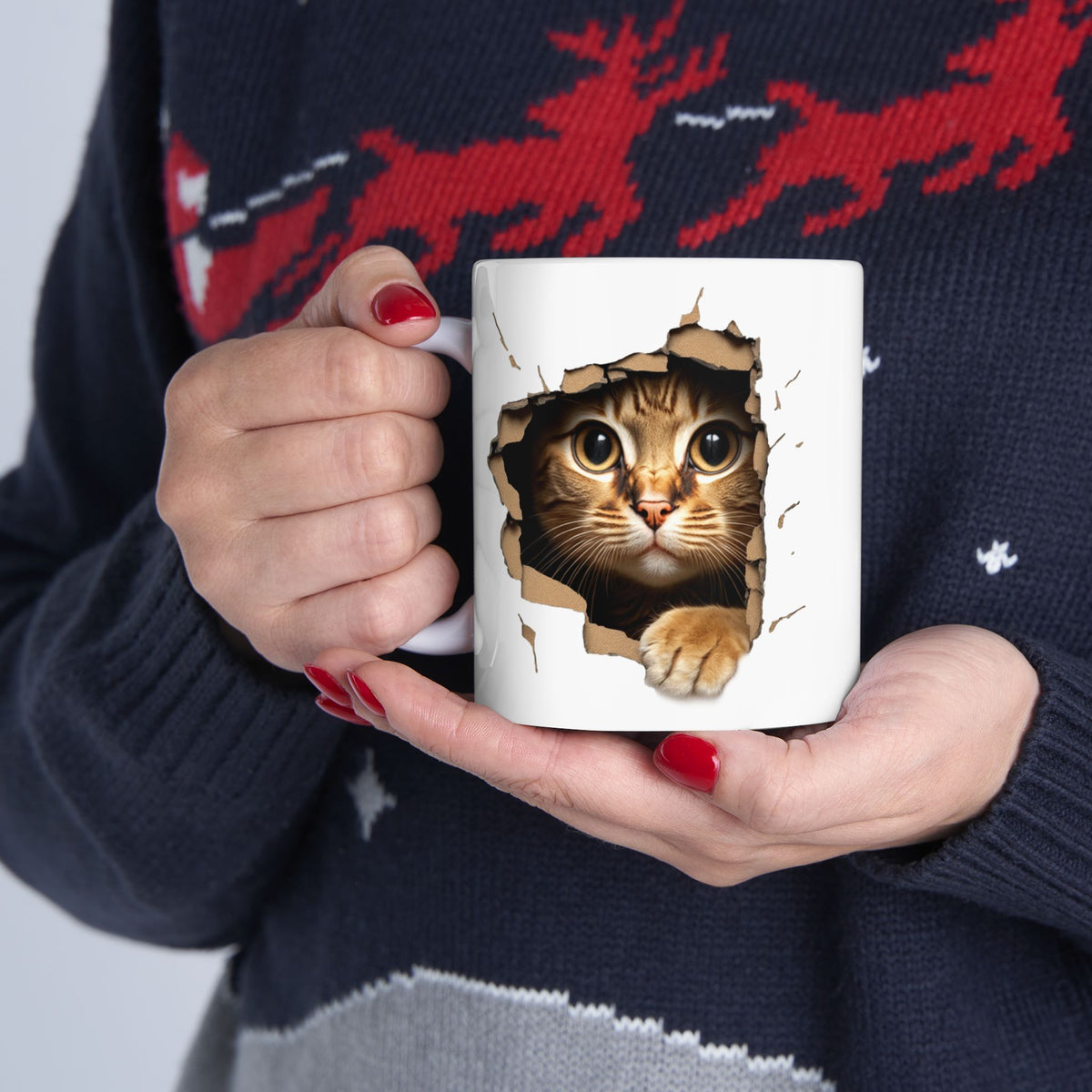 Cute Kitten Looks From Torn Wall Mug