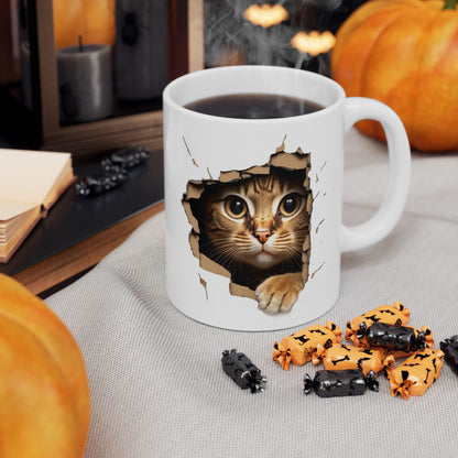 Cute Kitten Looks From Torn Wall Mug